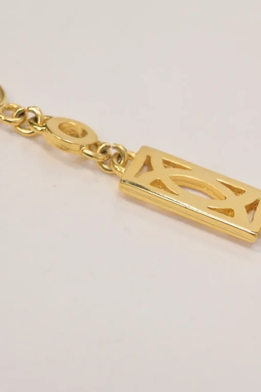 Gold-tone metallic Medusa medallion chain belt with hook fastening