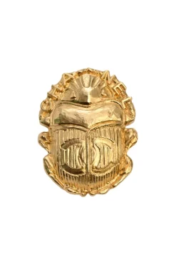 Gold-tone metallic rhinoceros beetle brooch