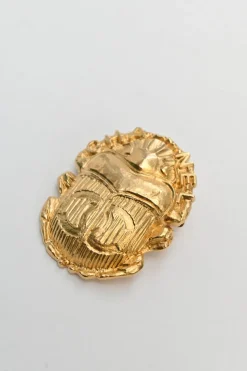 Gold-tone metallic rhinoceros beetle brooch