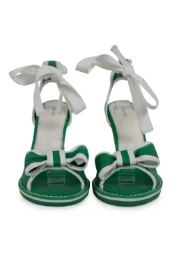Green and white fabric wedges with ribbon on the vamp