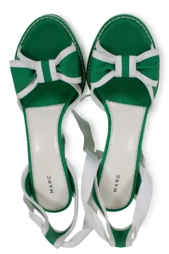Green and white fabric wedges with ribbon on the vamp