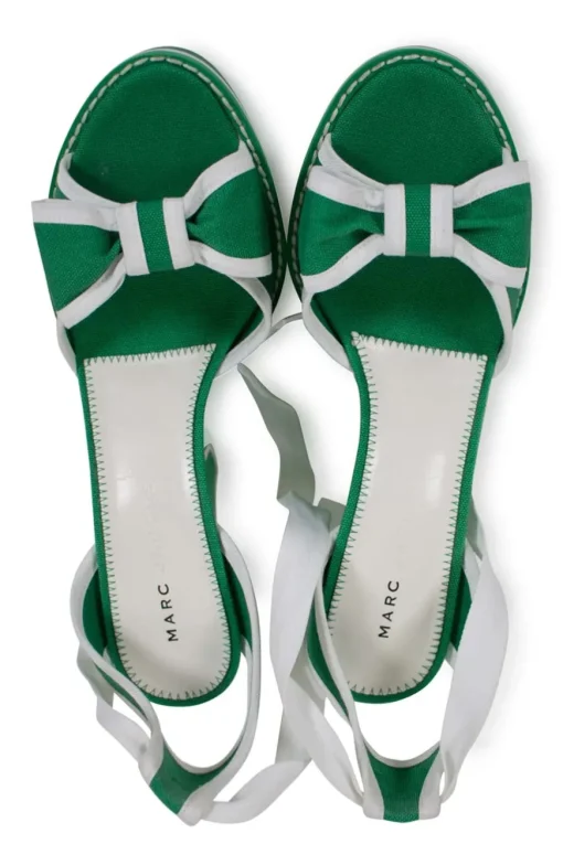 Green and white fabric wedges with ribbon on the vamp