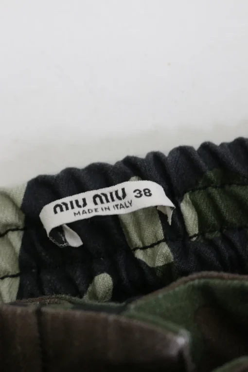 Green cotton-blend camouflage print crystal-embellished belted mini skirt with beaded logo patch