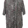 Green cotton-blend paisley print two-piece set with short sleeve shirt and drop-waist ruffle skirt