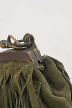 Green fringe suede purse with bent metallic bamboo handle and jade pendant