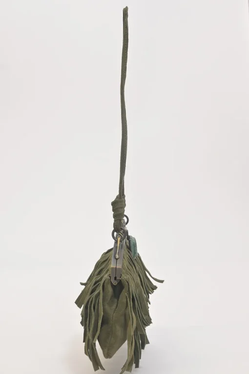 Green fringe suede purse with bent metallic bamboo handle and jade pendant