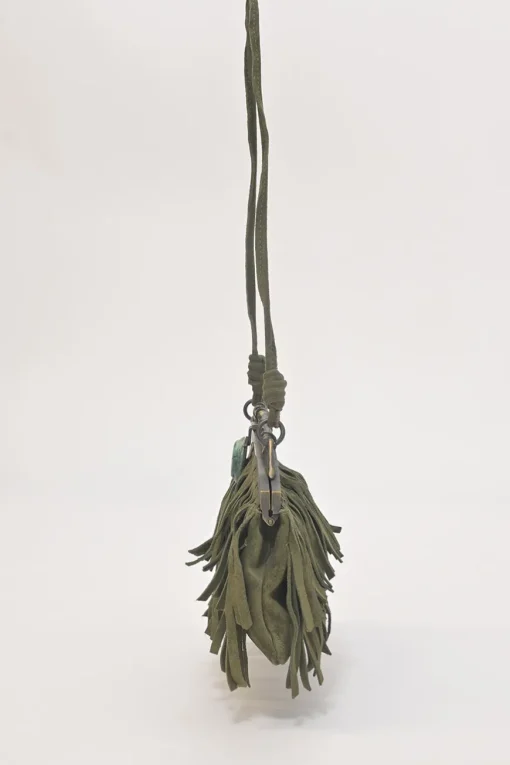 Green fringe suede purse with bent metallic bamboo handle and jade pendant