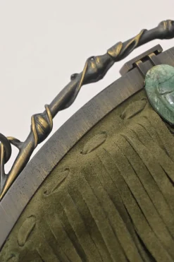 Green fringe suede purse with bent metallic bamboo handle and jade pendant