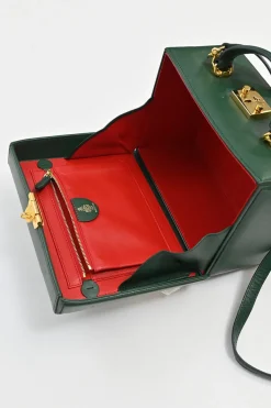 Green leather Grace top handle box purse with gold-plated brass hardware and detachable shoulder strap