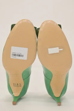 Green patent leather round-toe Trompette comma heel pumps