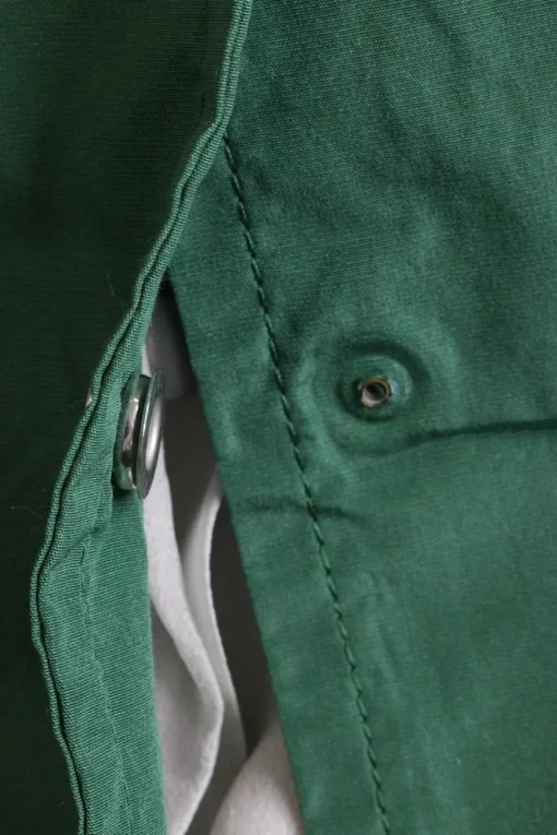 Green polyester-blend snap-front pencil skirt with ribbed waistband