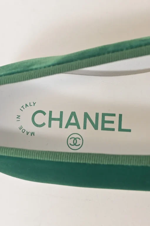 Green velvet and leather round-toe ballerinas featuring contrasting Coco Mark topstitched cap toes