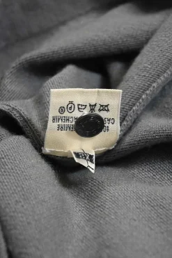 Grey cashmere jersey knit two-piece set with turtleneck vest and crewneck button-front cardigan
