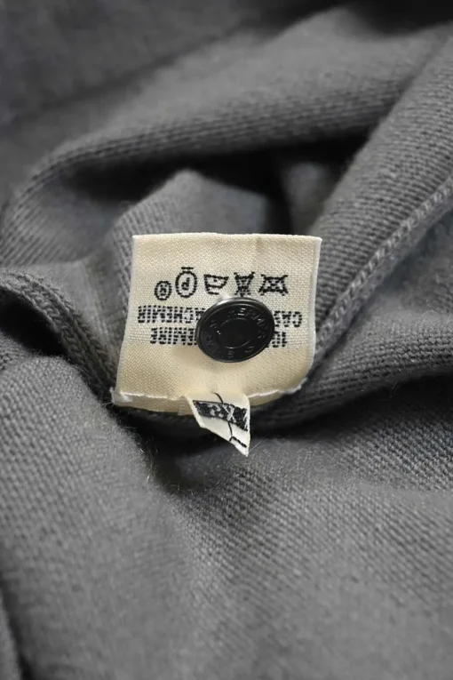 Grey cashmere jersey knit two-piece set with turtleneck vest and crewneck button-front cardigan