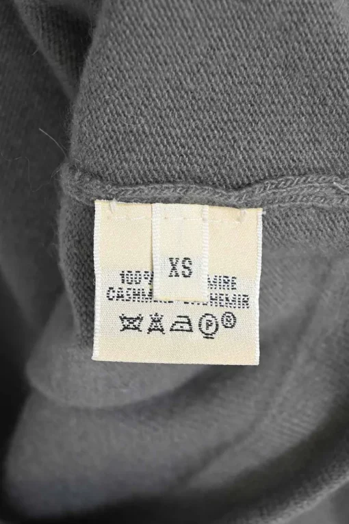 Grey cashmere jersey knit two-piece set with turtleneck vest and crewneck button-front cardigan
