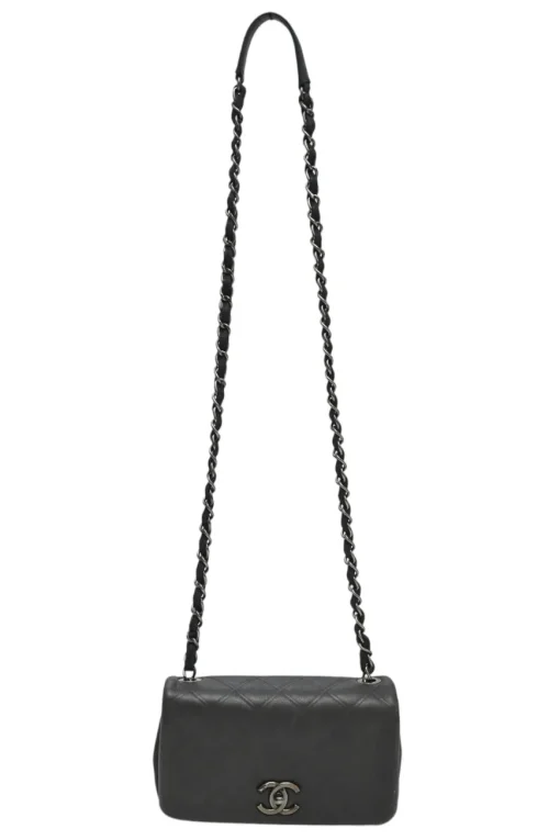 Grey embossed matelassé calfskin crossbody flap bag with gunmetal Coco Mark turnlock closure