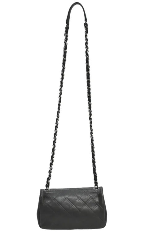 Grey embossed matelassé calfskin crossbody flap bag with gunmetal Coco Mark turnlock closure