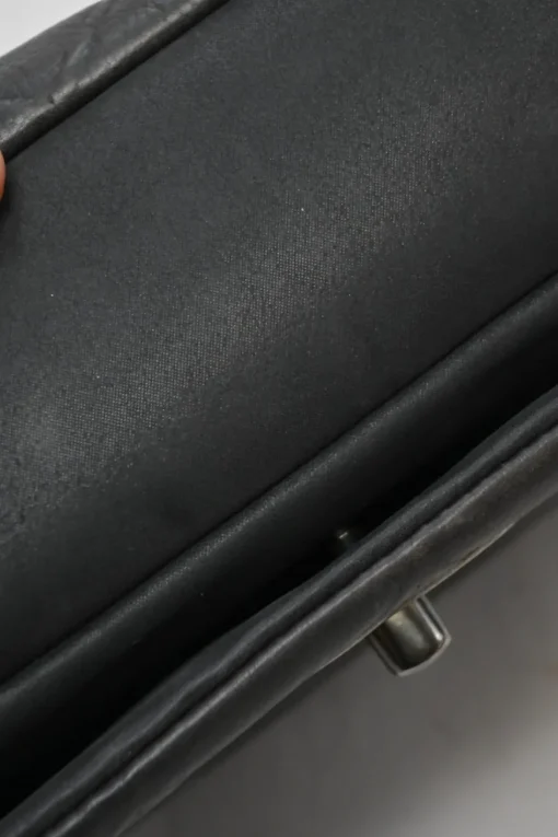 Grey embossed matelassé calfskin crossbody flap bag with gunmetal Coco Mark turnlock closure