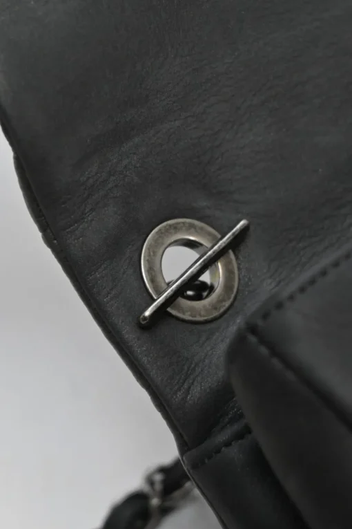 Grey embossed matelassé calfskin crossbody flap bag with gunmetal Coco Mark turnlock closure