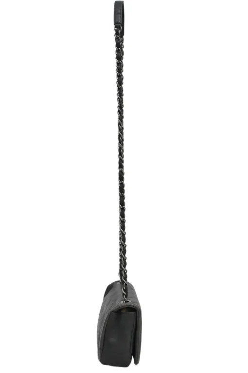 Grey embossed matelassé calfskin crossbody flap bag with gunmetal Coco Mark turnlock closure