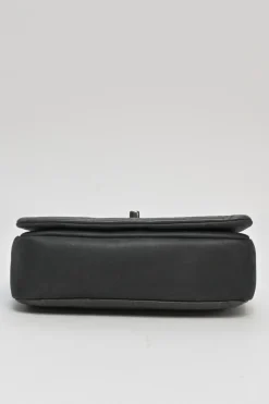 Grey embossed matelassé calfskin crossbody flap bag with gunmetal Coco Mark turnlock closure