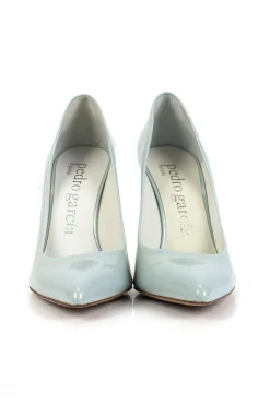 Grey patent leather high heeled pumps.
