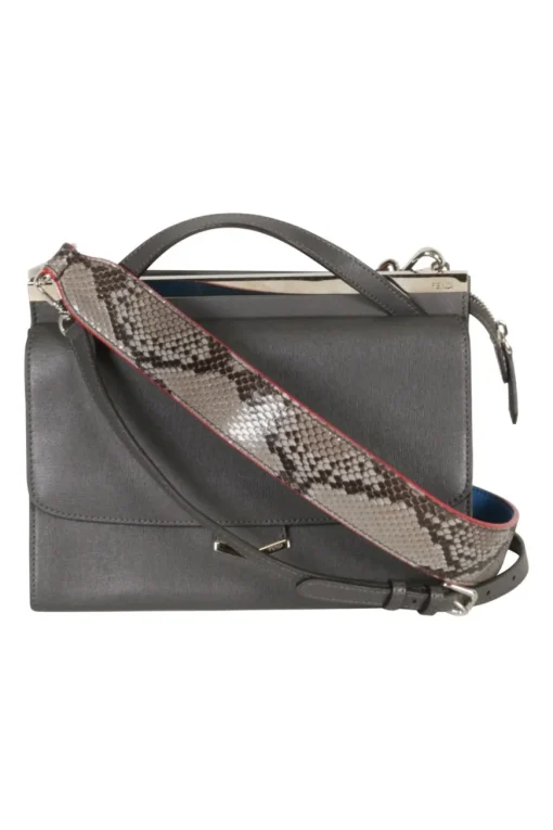 Grey pebbled leather bag with front flap, magnetic clasp and short top handle.