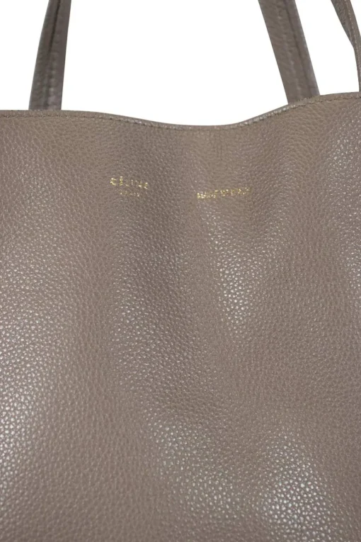 Grey pebbled leather tote bag with suede interior