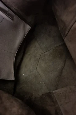 Grey pebbled leather tote bag with suede interior