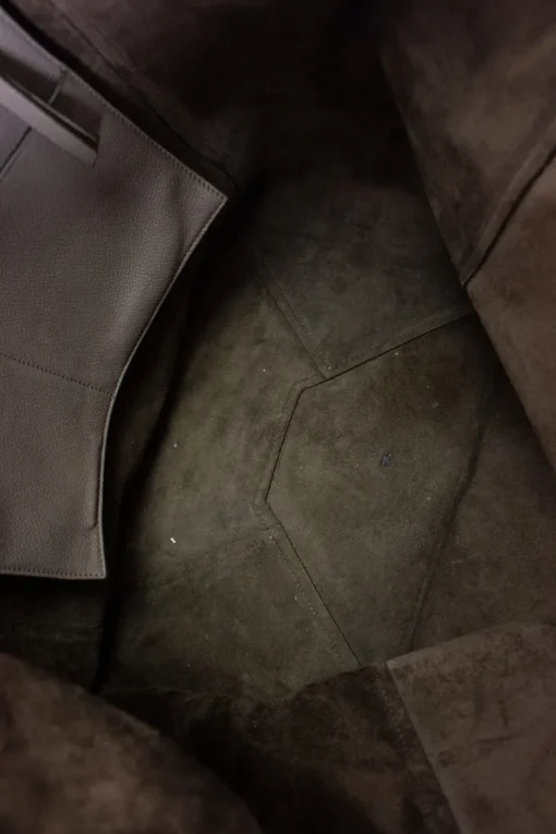 Grey pebbled leather tote bag with suede interior