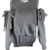 Grey, ribbed, long-sleeved, shoulder less, cropped cashmere sweater with lace up detailing on the shoulders