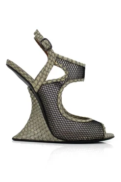 Grey snake skin wedge sandals with black mesh details and curved heels.
