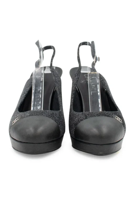 Grey suede and black leather pumps