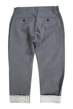 Grey tapered dress pants with white lace cuffed hem