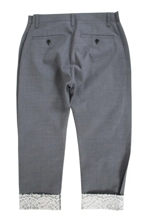 Grey tapered dress pants with white lace cuffed hem