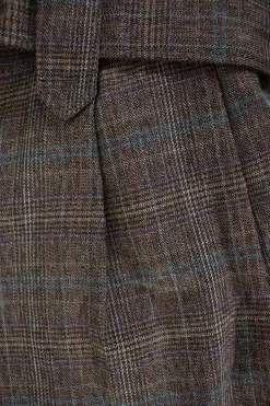 Grey tartan shorts with brown belt
