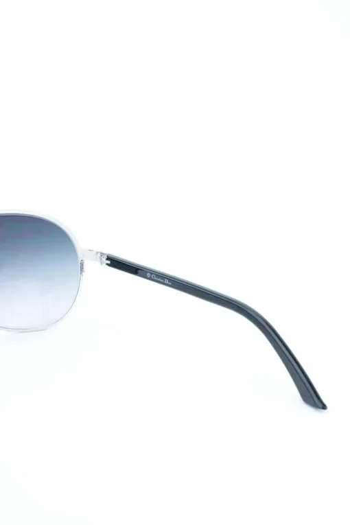 Grey tinted aviator, silver metal framed sunglasses with ladybird emblem