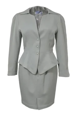 Grey wool two-piece skirt suit featuring spread collar sculpted jacket and slit-front pencil skirt
