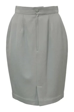 Grey wool two-piece skirt suit featuring spread collar sculpted jacket and slit-front pencil skirt