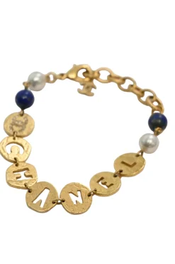 Hammered gold-tone metal, enamel, and resin cutout logo charm bracelet with lobster-clasp closure