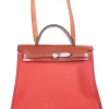 Herbag Zip 31 backpack in burgundy leather top flap and red canvas