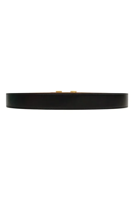 Hermes gold tone H buckle with belt in black leather and brown on reverse