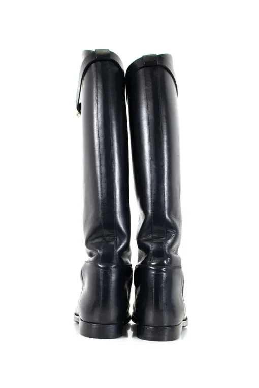 Hermes knee high riding boot in black leather with strap and Hermes twist lock