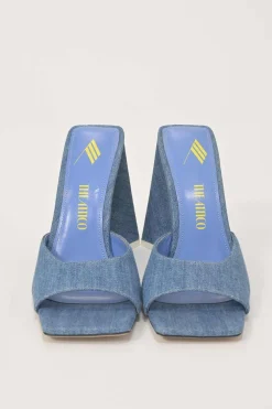 Indigo cotton denim and leather Devon mules with square toe and pyramid heels