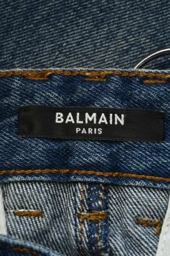 Indigo cotton denim high-rise flared jeans with exposed-seam detailing