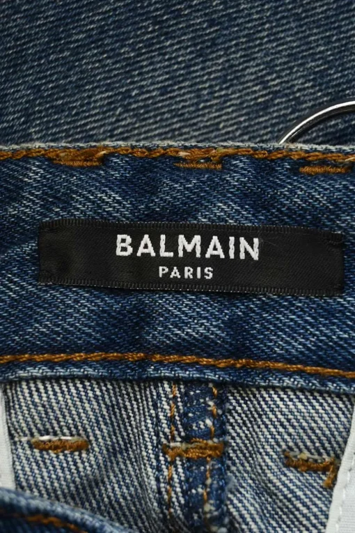 Indigo cotton denim high-rise flared jeans with exposed-seam detailing