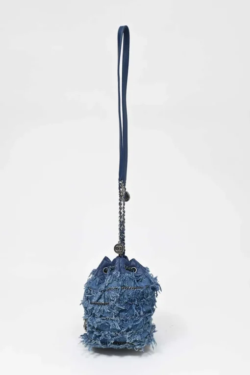Indigo lambskin leather and fringed cotton denim crossbody bucket bag with silver-tone hardware