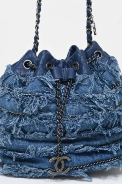 Indigo lambskin leather and fringed cotton denim crossbody bucket bag with silver-tone hardware