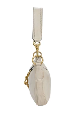 Ivory aged leather snap hook shoulder bag with gold-tone metallic hardware