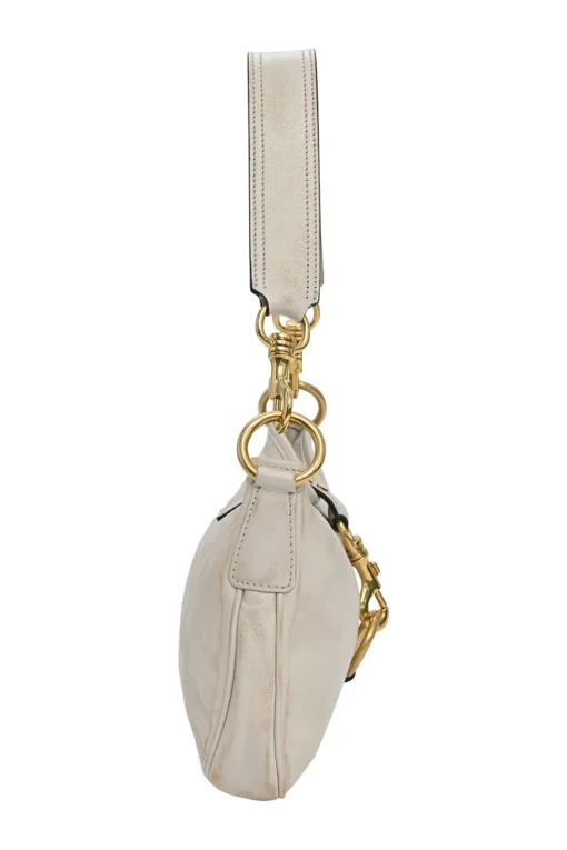 Ivory aged leather snap hook shoulder bag with gold-tone metallic hardware